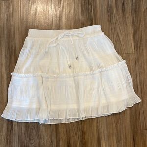 White ruffled skirt